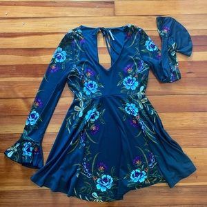 NWOT Free People, open back w/bell long sleeves, perfect for a cool summer day!
